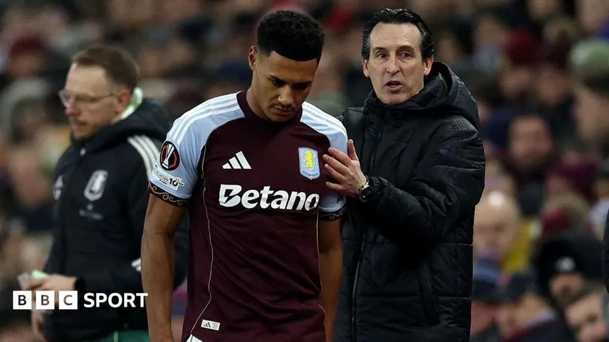 Aston Villa player speaking with manager during match Aston Villa player speaking with manager during match