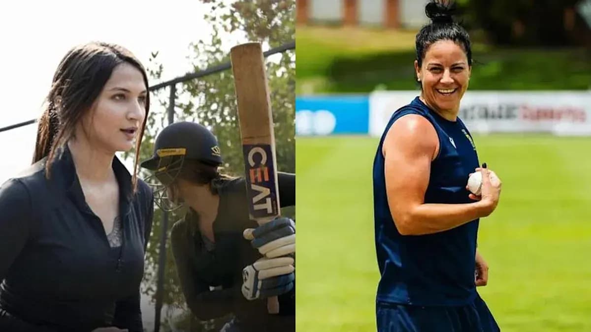 Two women in cricket gear on the field Two women in cricket gear on the field