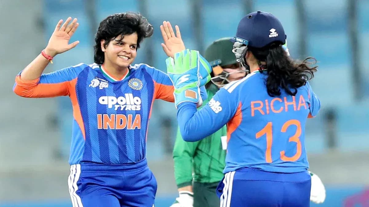 Indian players celebrating a wicket during cricket match Indian players celebrating a wicket during cricket match