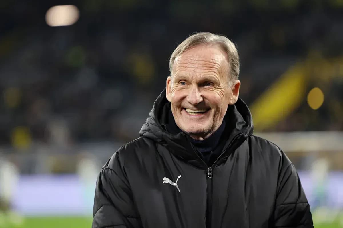 Smiling man in black jacket at football match Smiling man in black jacket at football match