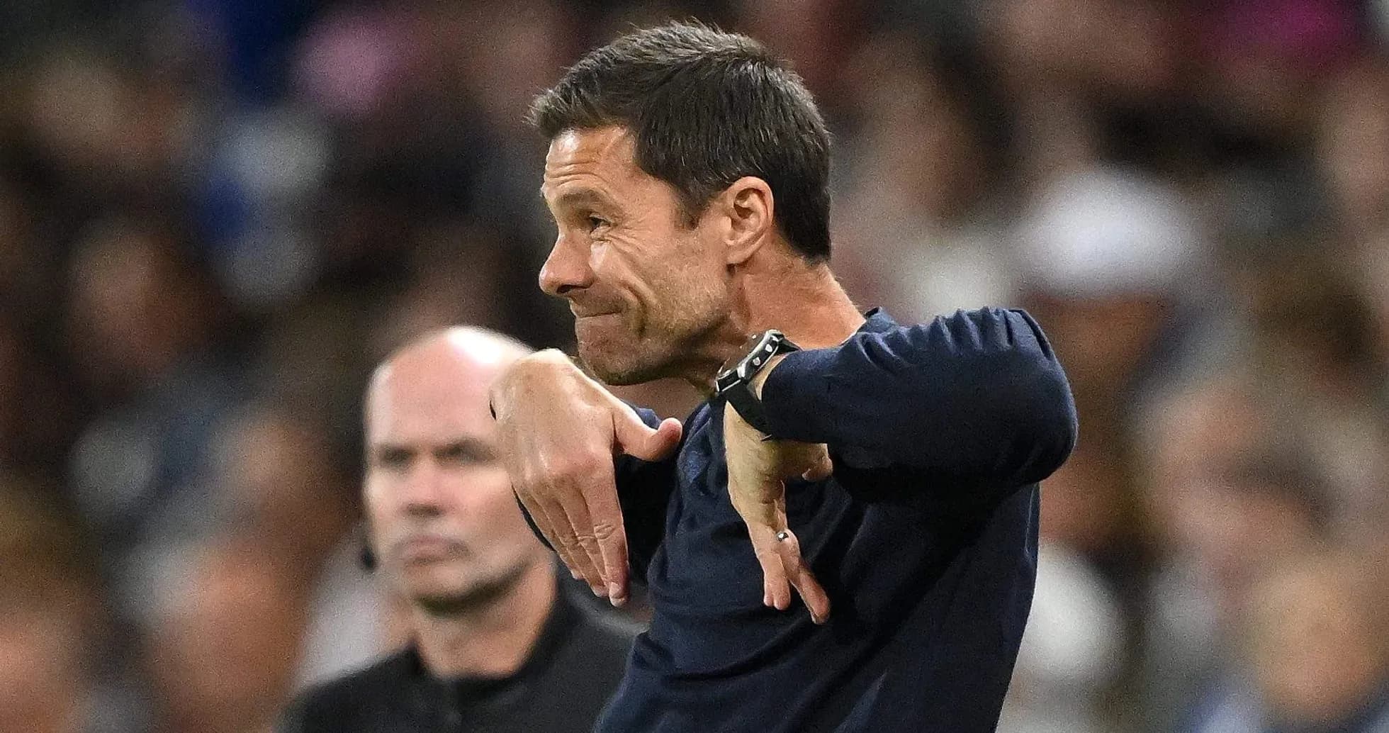 Coach gesturing on the sideline during match Coach gesturing on the sideline during match