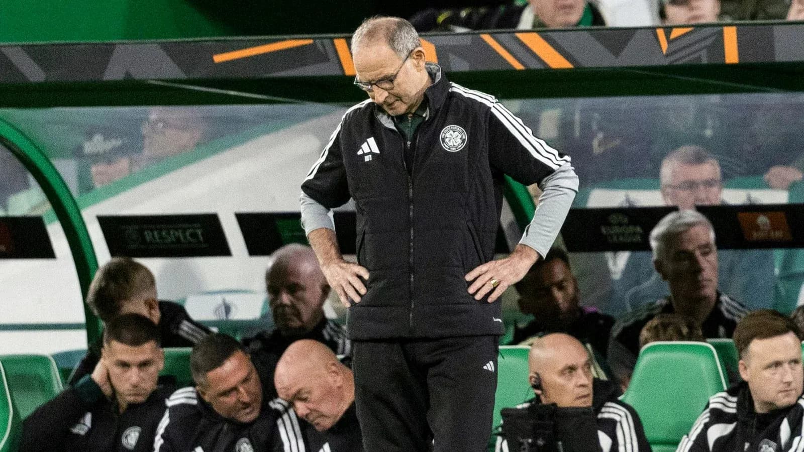 Coach looking down on the sidelines during match Coach looking down on the sidelines during match