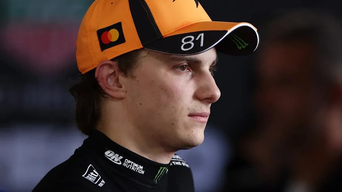 Driver wearing an orange cap during an event Driver wearing an orange cap during an event