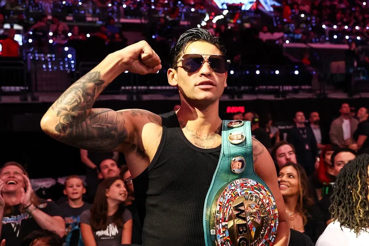 Fighter posing with WBC championship belt in audience Fighter posing with WBC championship belt in audience
