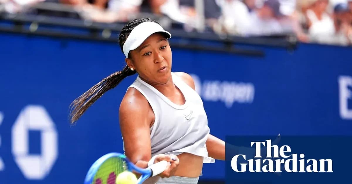 Naomi Osaka hitting a tennis ball during match Naomi Osaka hitting a tennis ball during match
