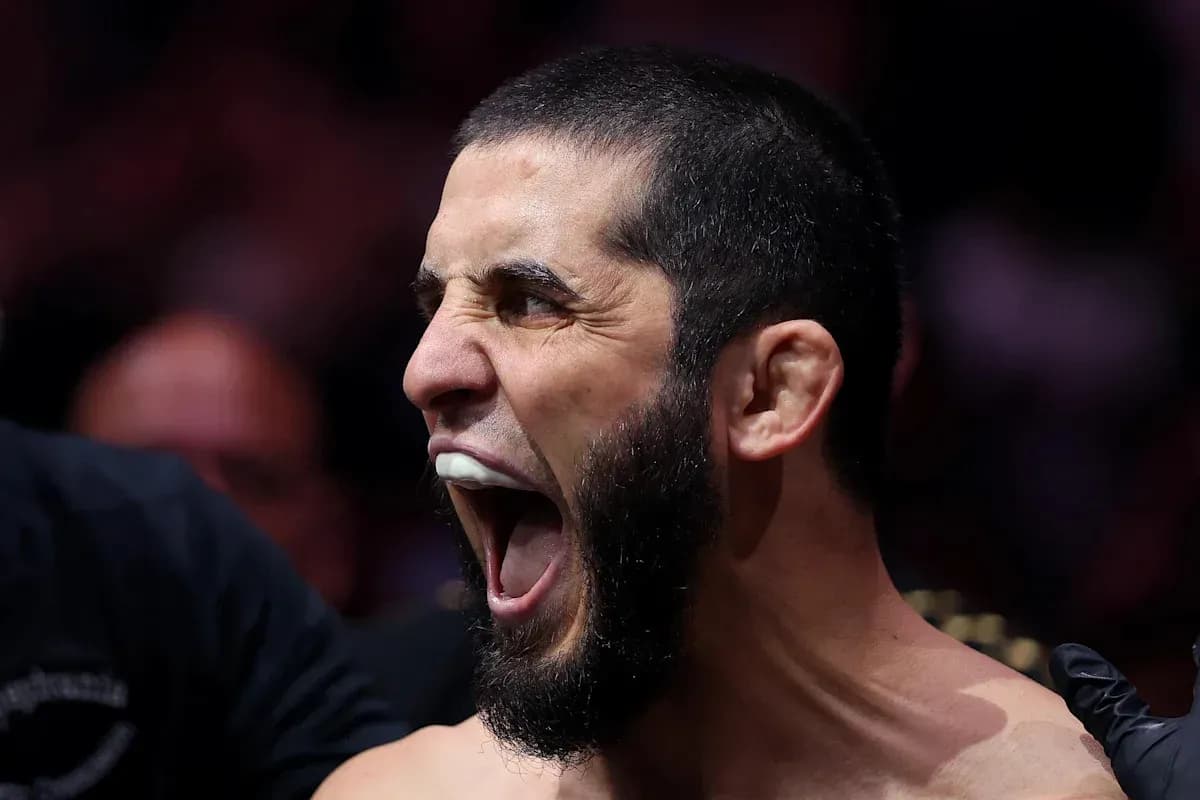 Fighter yelling with mouthguard before match Fighter yelling with mouthguard before match