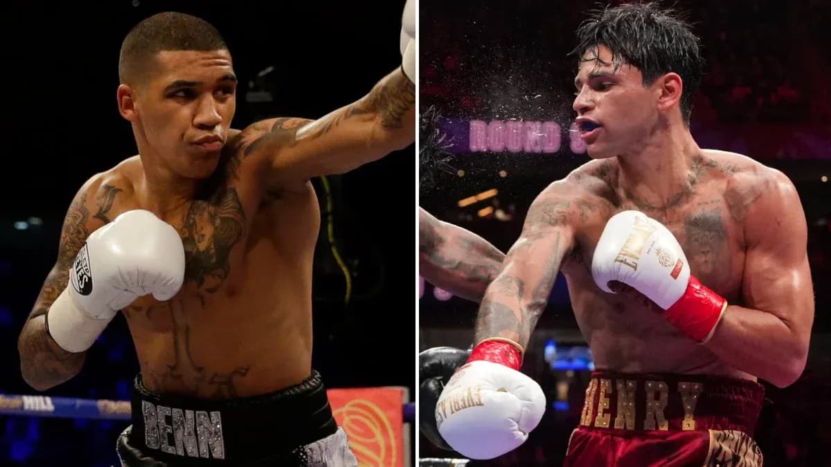 Two boxers throwing punches in the ring Two boxers throwing punches in the ring