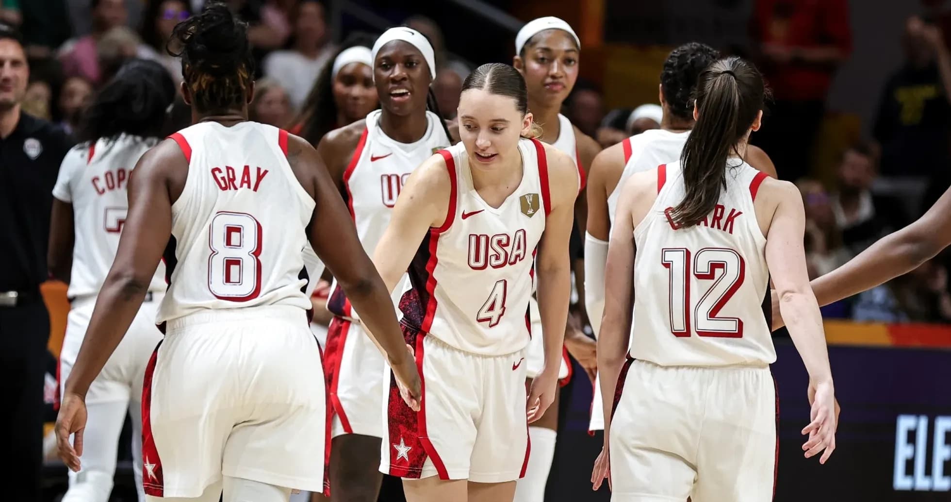Team USA celebrating during a basketball game Team USA celebrating during a basketball game
