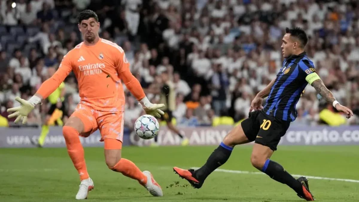 Goalkeeper blocking a shot during a match Goalkeeper blocking a shot during a match